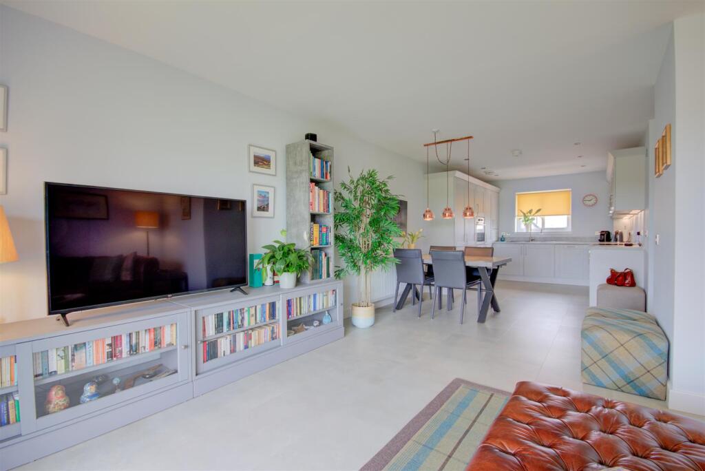 OPEN PLAN SITTING ROOM/KITCHEN