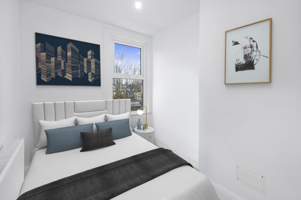 Disclaimer: This image has been virtually staged to illustrate potential layout and furnishings.