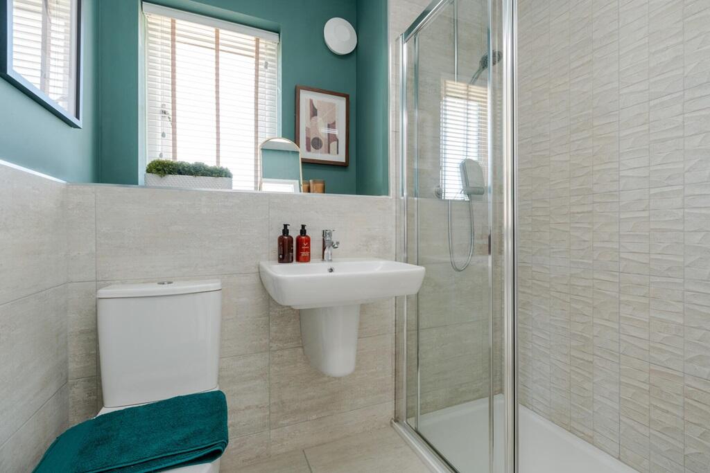 Bedroom 1 is complete with its own private ensuite