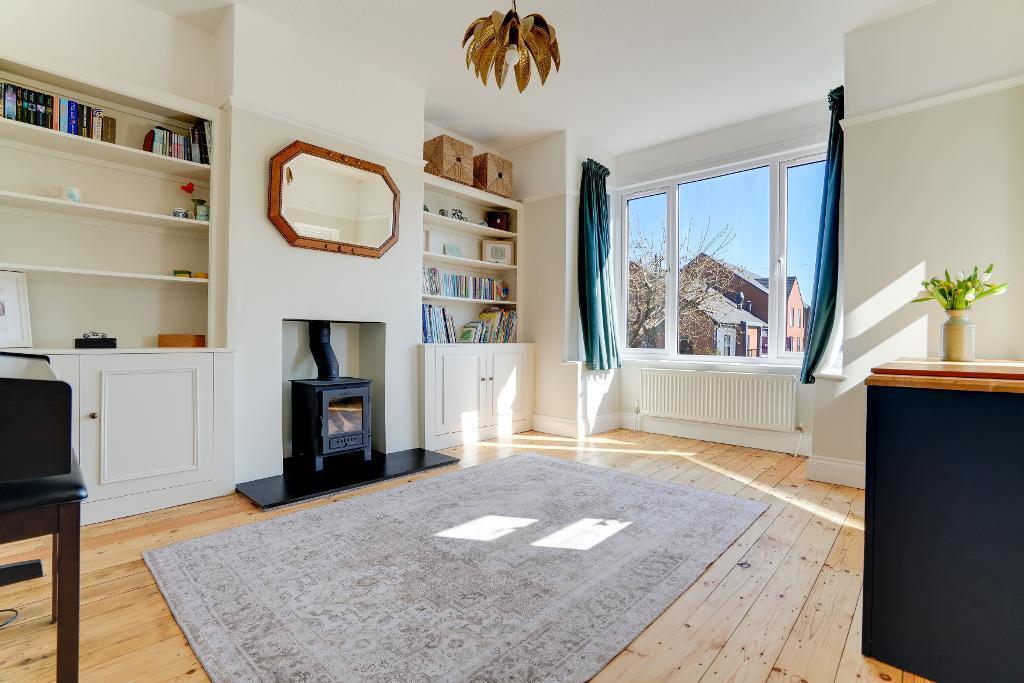 Front sitting room with alcove cupboards