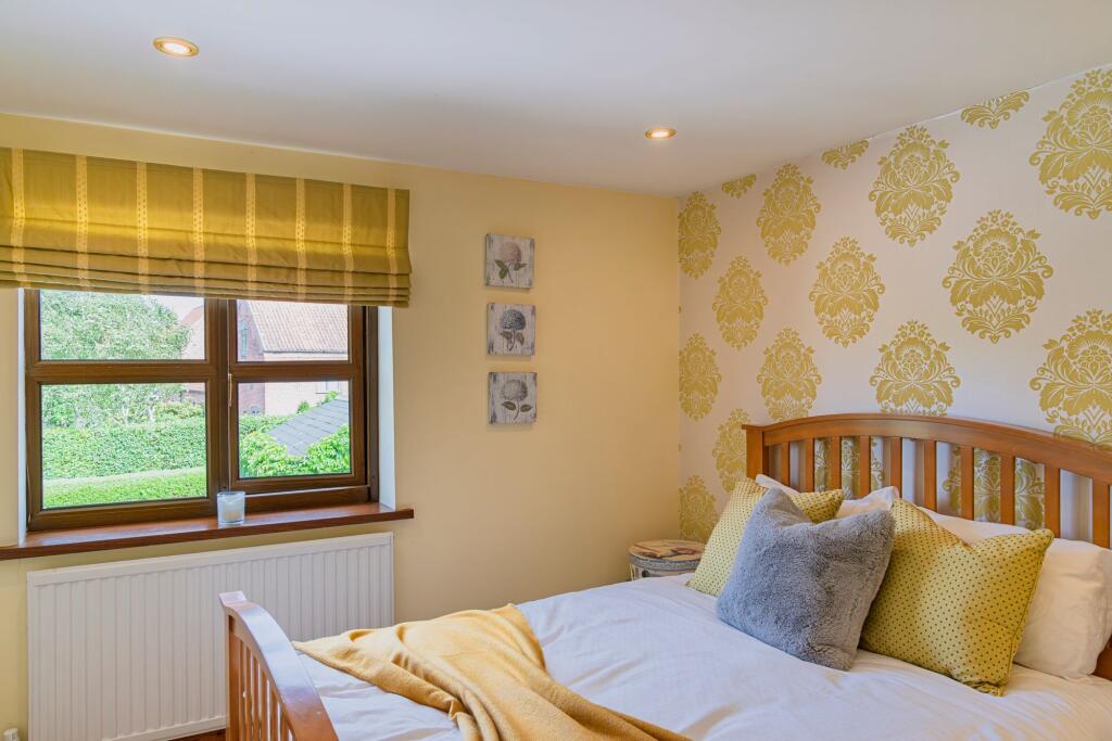 Bedroom 4 with views to the front