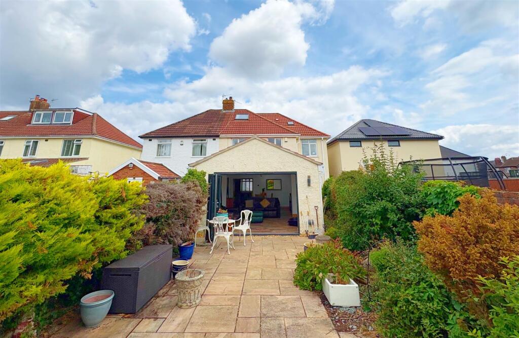 Rear view of property and patio.jpg