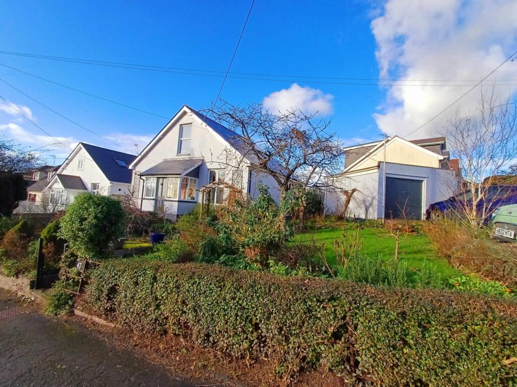 Front of property, corner plot and garage