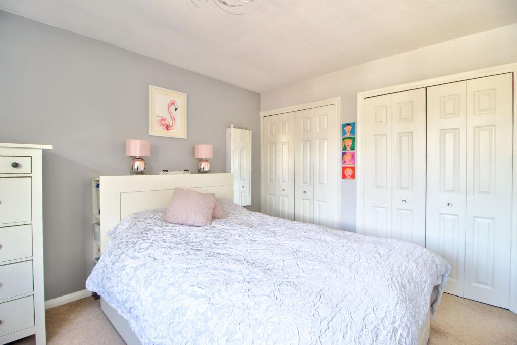 Bedroom One with plenty of storage