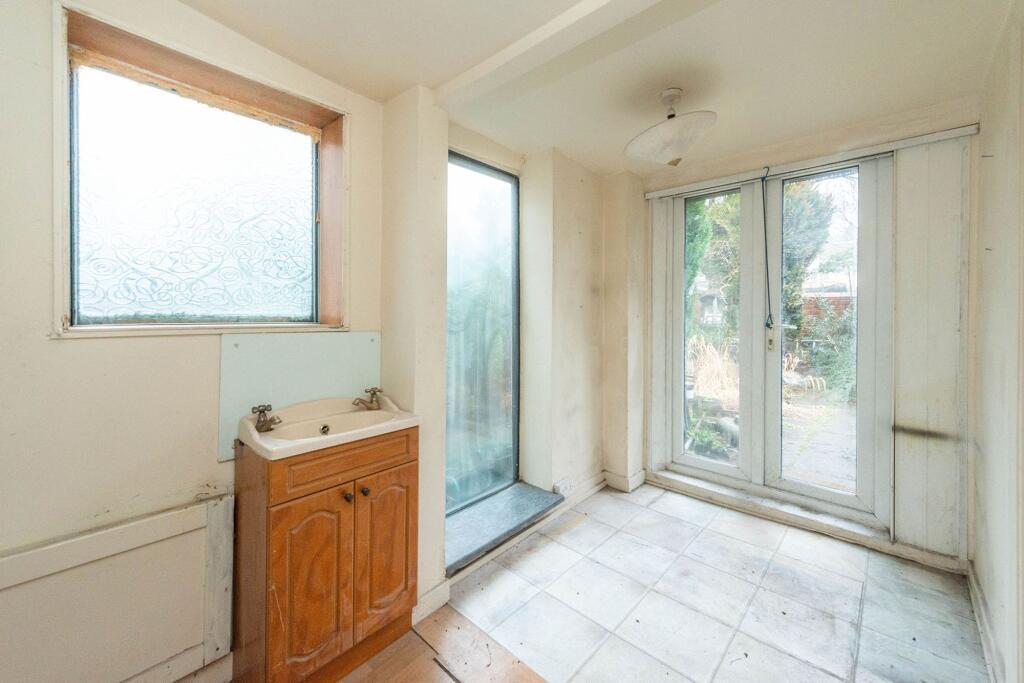 SITTING ROOM KITCHEN AND GARDEN ROOM