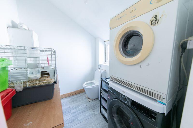 Utilities space and washroom