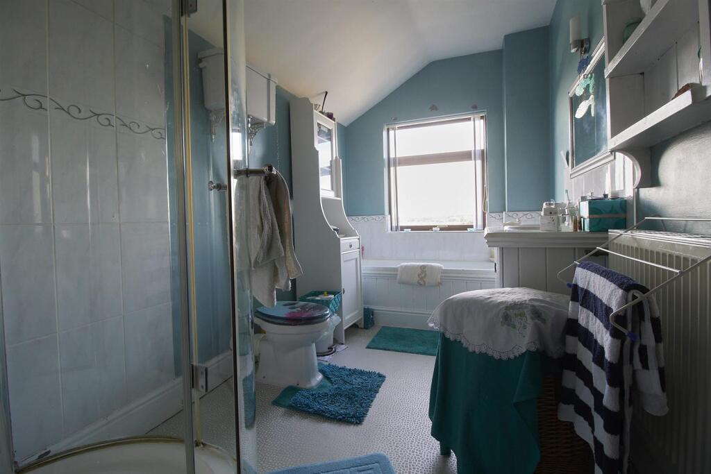 Family bathroom to rear