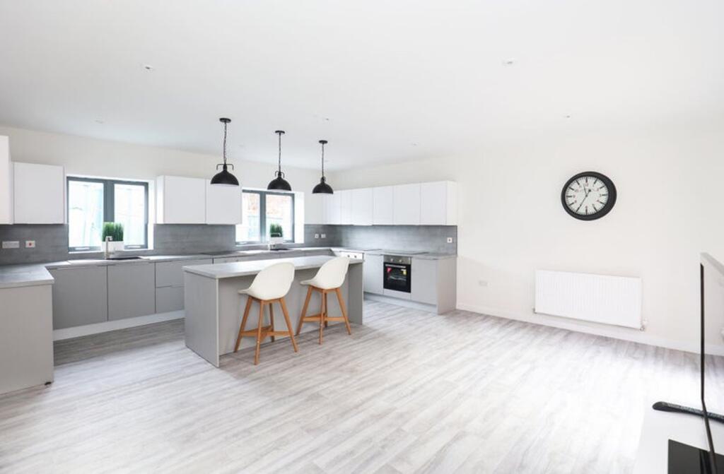A spacious and modern kitchen, perfect for stud...