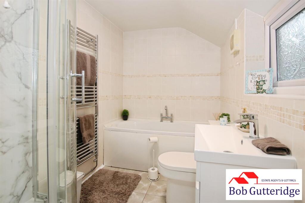 FULLY TILED GROUND FLOOR BATHROOM