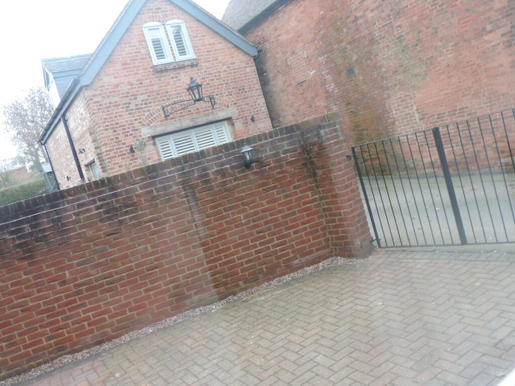 rear gated patio garden/parking