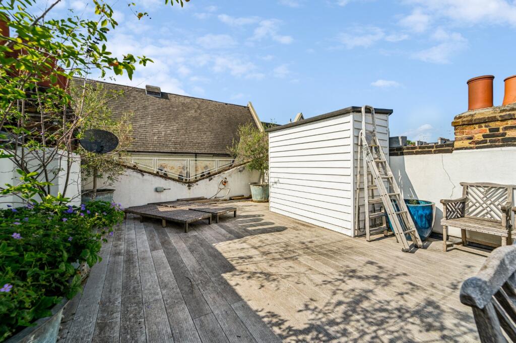 property in Elgin Crescent, 
Westbourne Park, W11