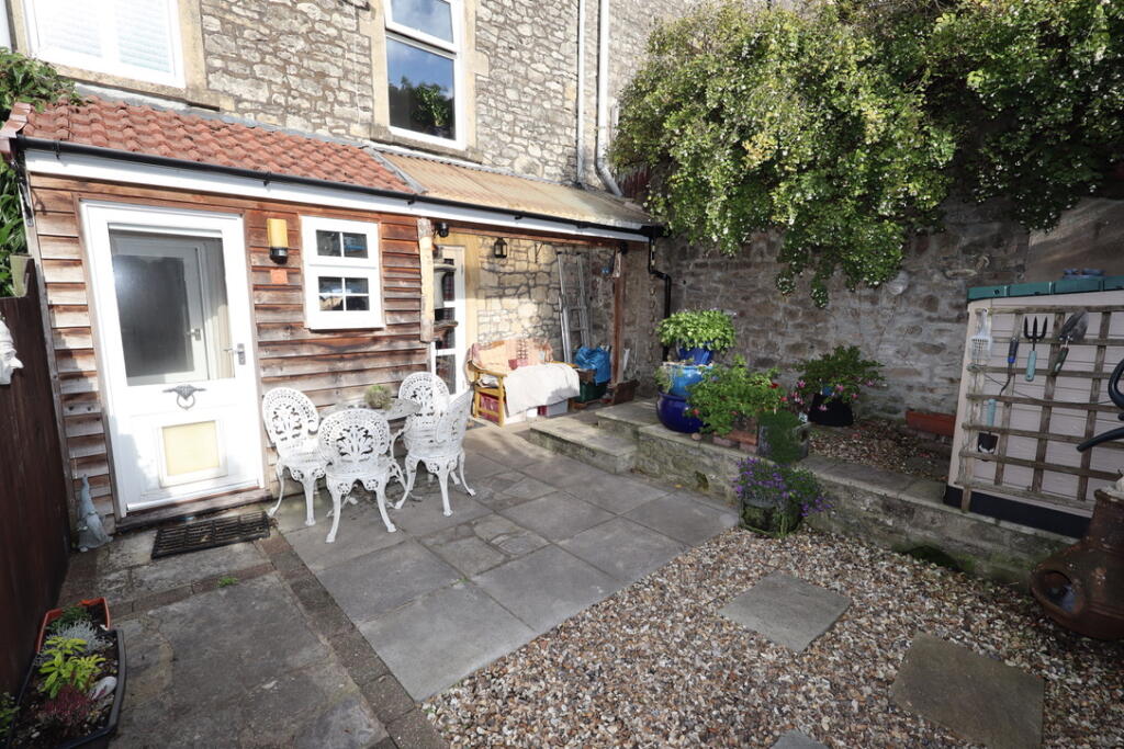 Garden and covered porch area