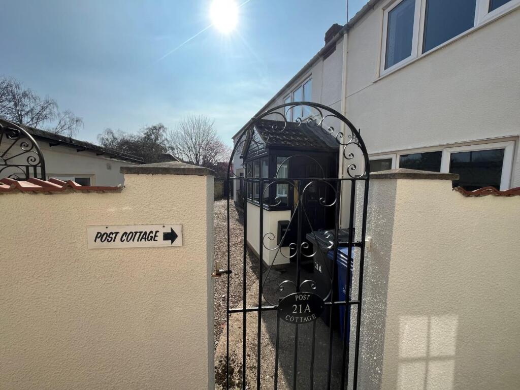 Gated entrance to side through passage.jpg