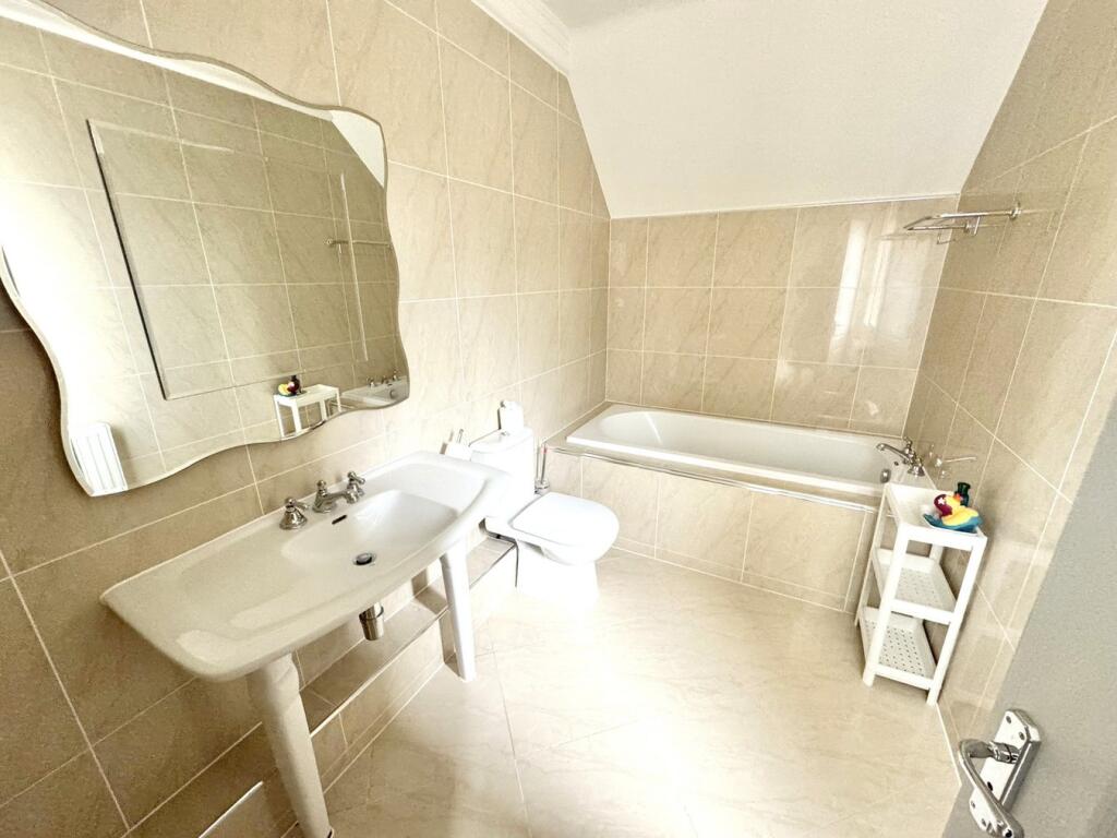 En suite bathroom to bedroom 3