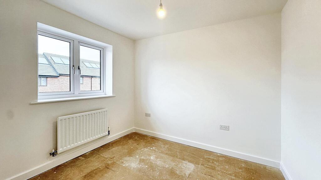 Bright and inviting double bedroom featuring a ...