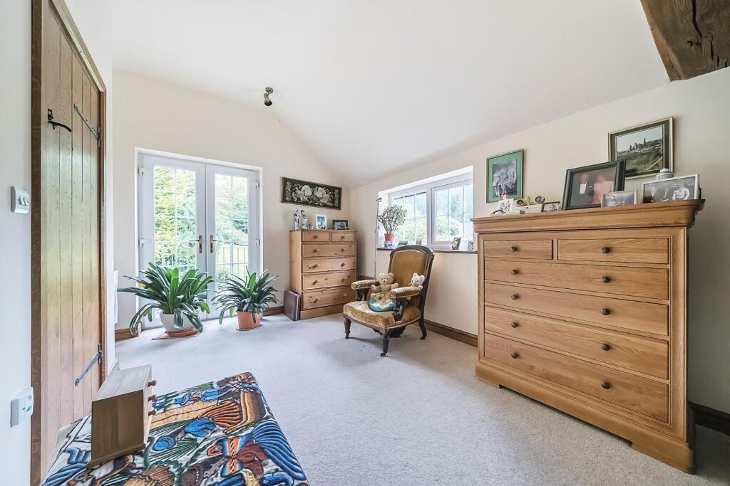 Bedroom 1 with balcony.jpg