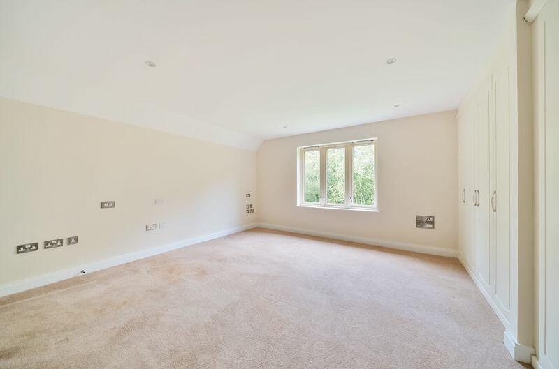 Master bedroom with fitted wardrobes