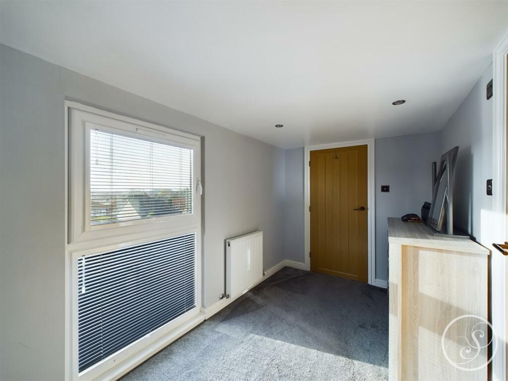 BEDROOM FOUR/DRESSING AREA