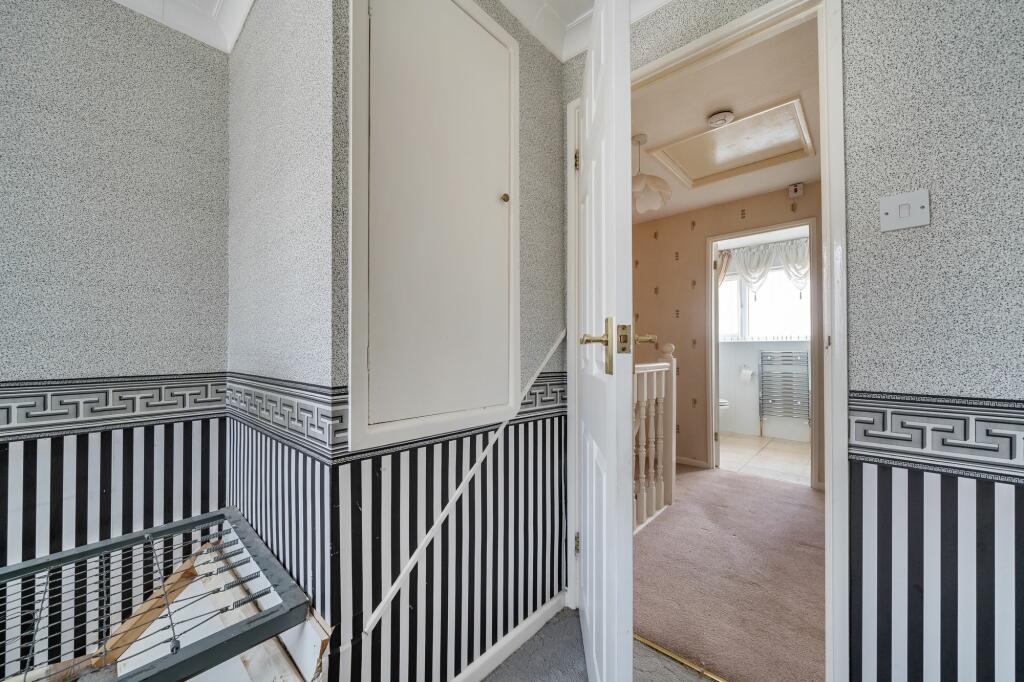 Landing with doors to bedrooms and bathroom