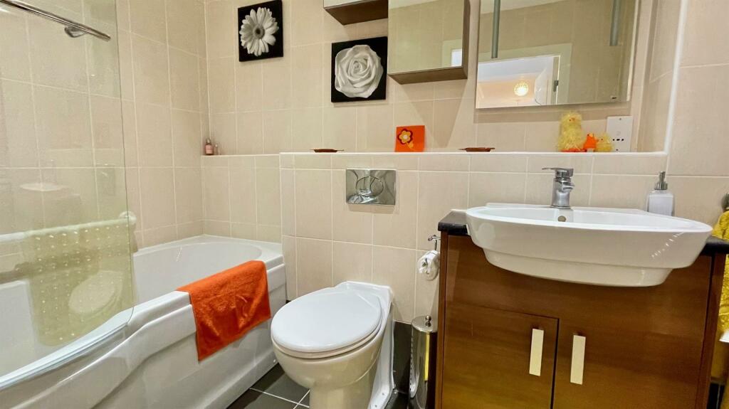 FULLY TILED BATHROOM