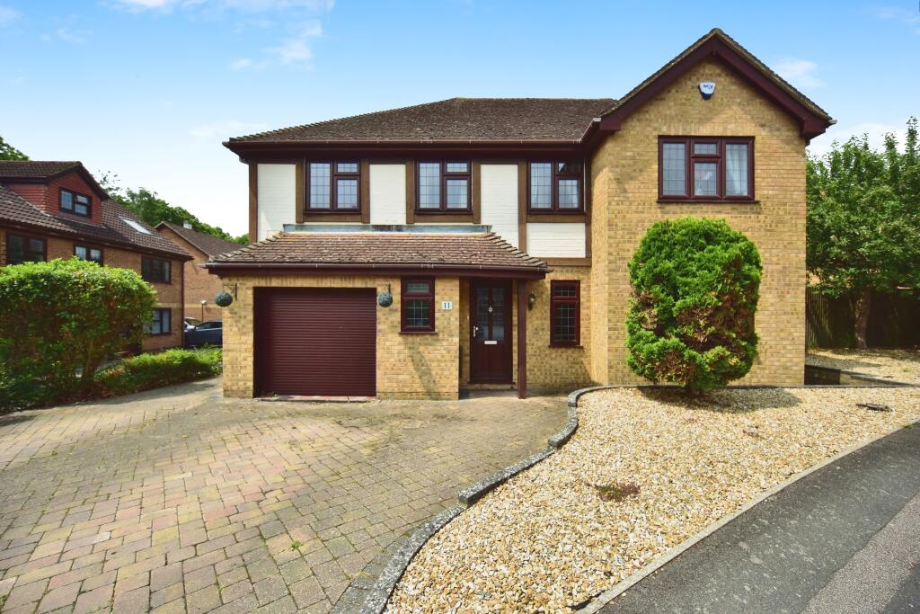 Outside View Of The Property With Driveway Parking