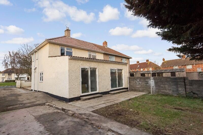 Rear view of a semi-detached house featuring a ...