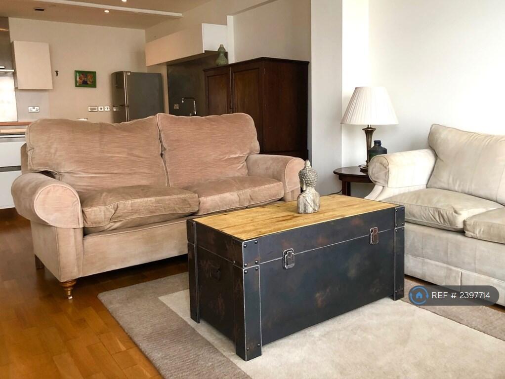 Living Room With Wood And Metal Chest