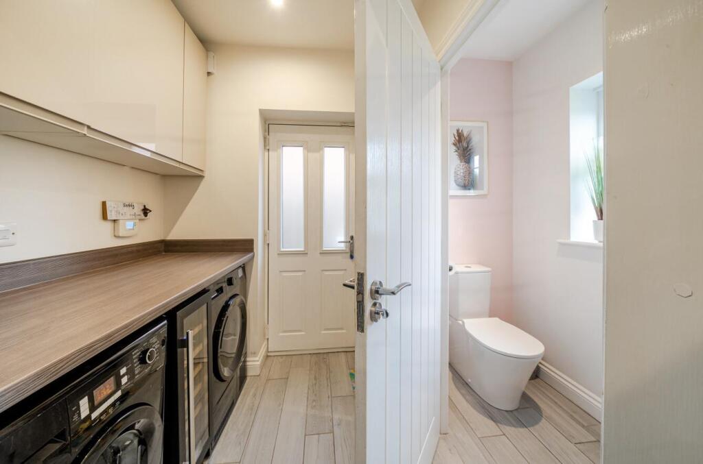 Utility downstairs WC