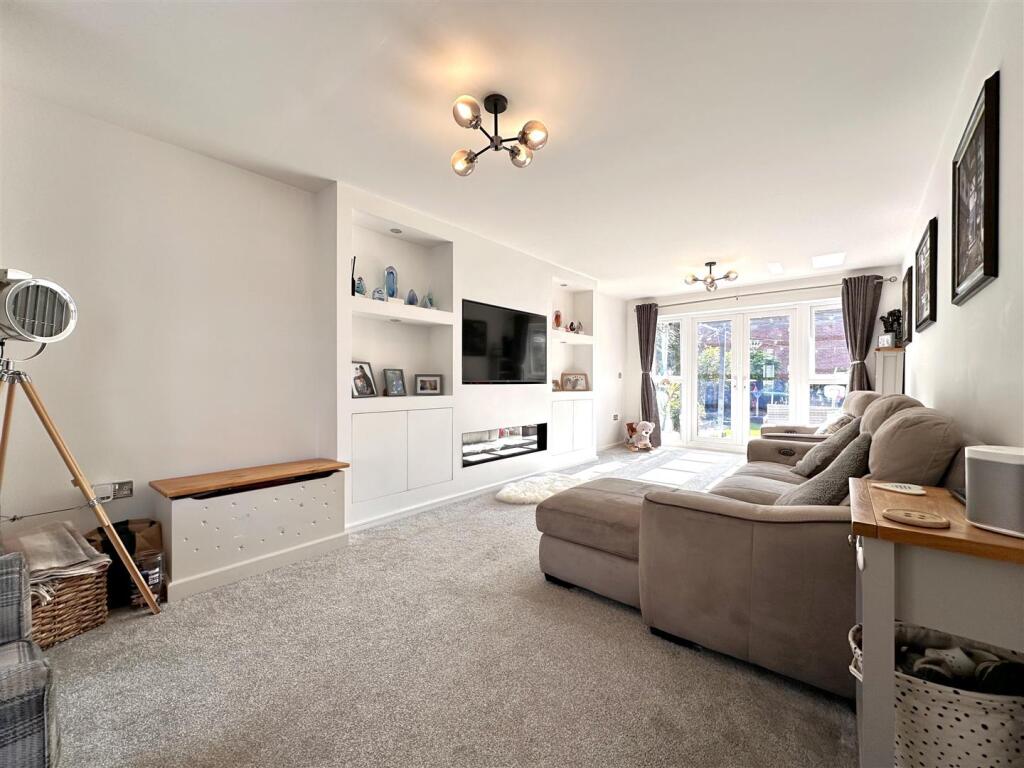 Generous Living Room With Media Wall 440