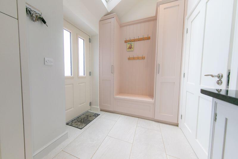 Utilities room and side porch
