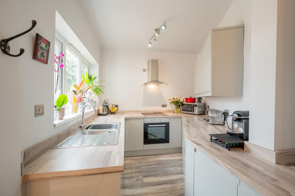 SITTING ROOM DINING ROOM AND KITCHEN