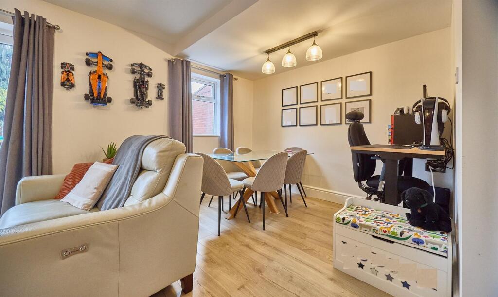 L shaped through lounge dining room to rear