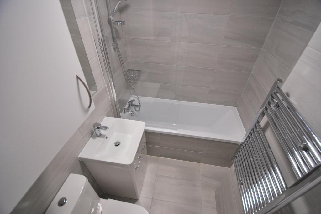 Luxurious Fully-Tiled Bathroom