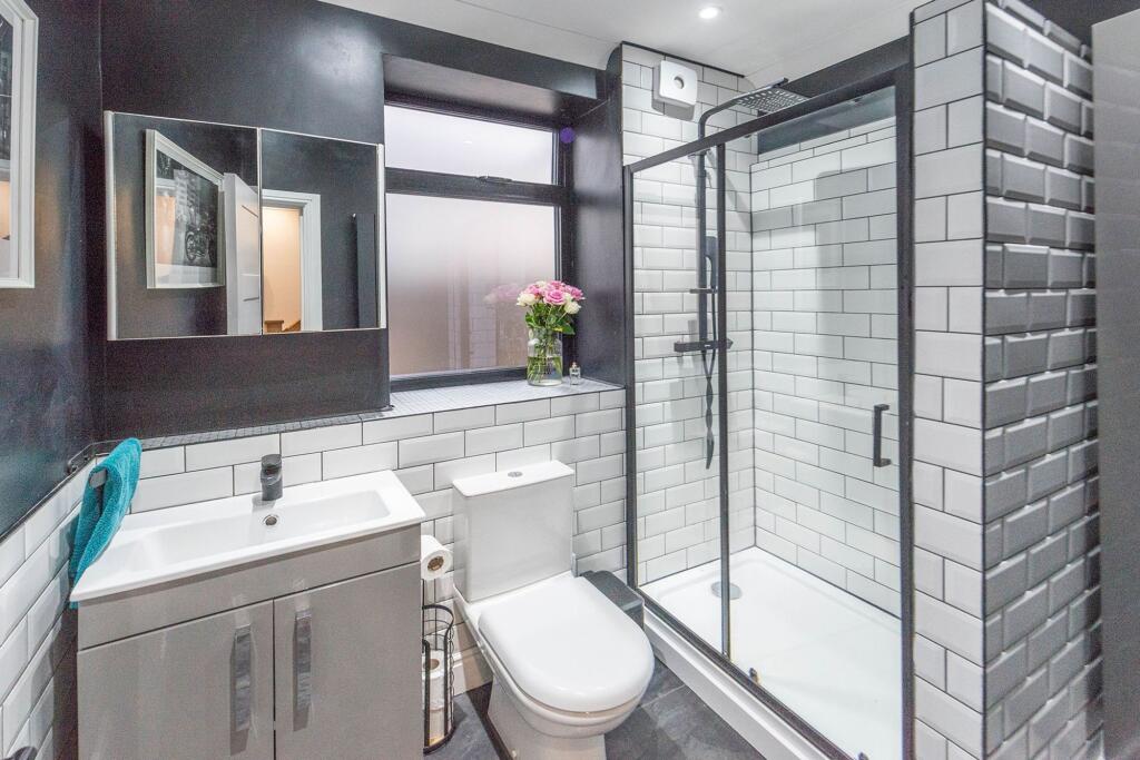 GROUND FLOOR BEDROOM SHOWER ROOM AND SITTING ROOM