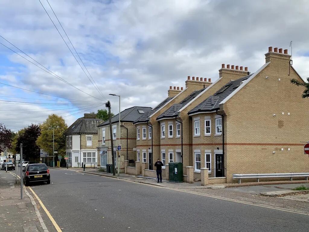 A well-maintained row of modern terraced houses...