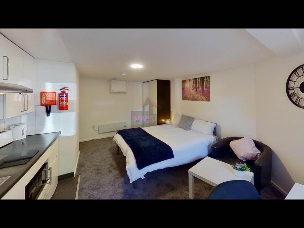 A modern, well-lit living space with a contempo...