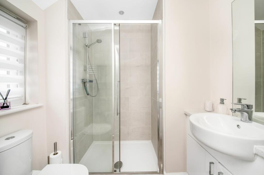 BEDROOM ONE EN-SUITE SHOWER ROOM