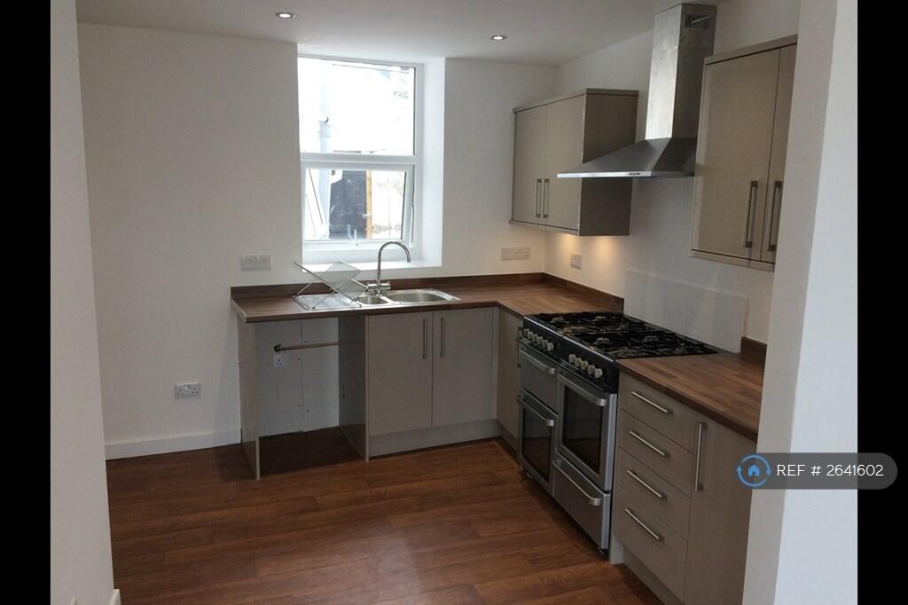 Kitchen With View Onto Courtyard