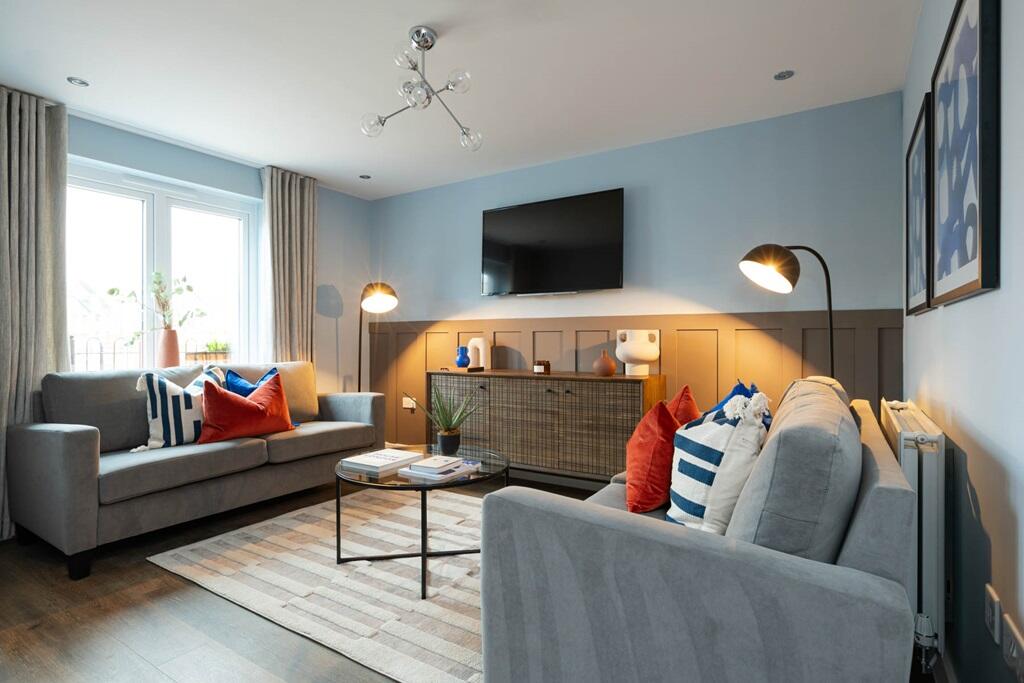 There's plenty of space for two 3-seater sofas in the living room