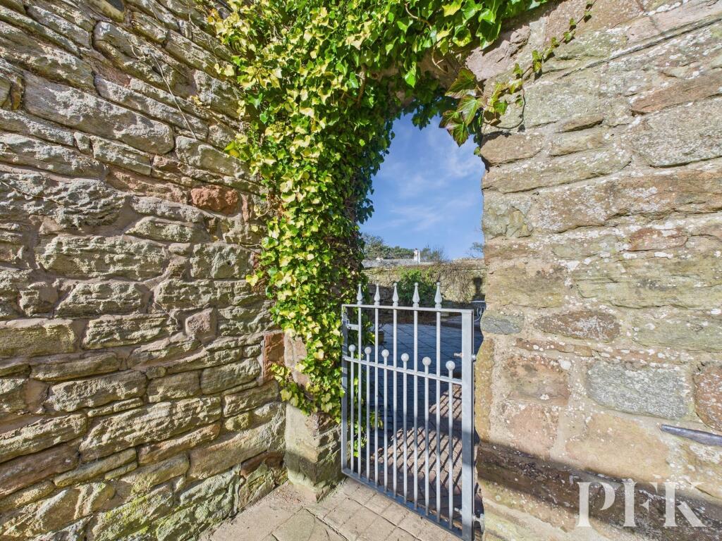 Gated access to rear garden