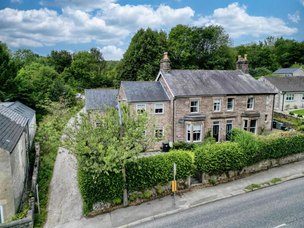 Front of the home and path to National Stone Centr