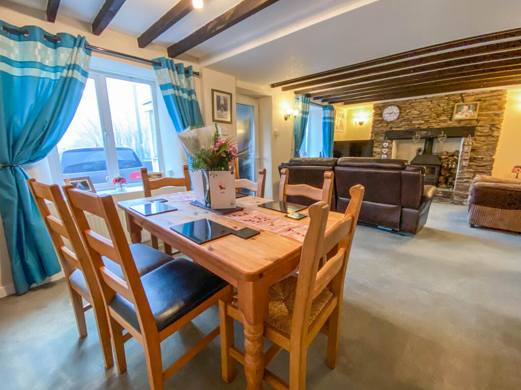 Sitting/Dining Room with beams