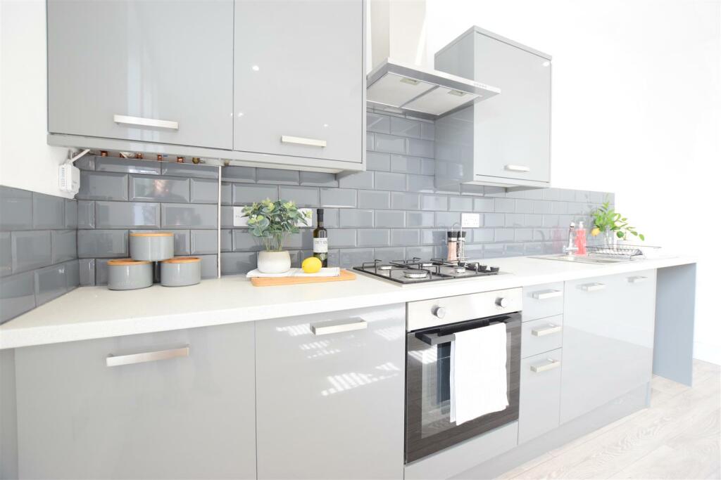 Apt 8 Living Kitchen  (2).JPG