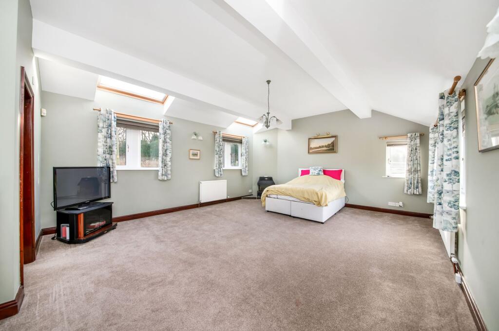GUEST BEDROOM FIVE