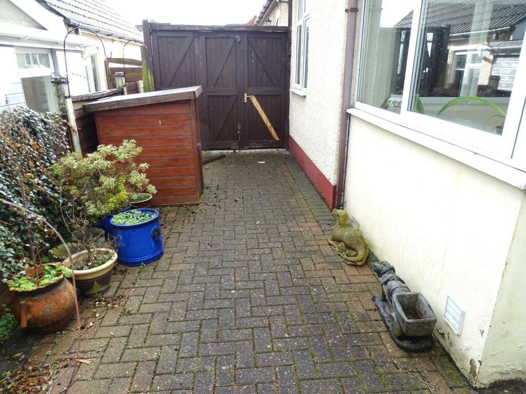 BRICK PAVED AREA TO SIDE ELEVATION