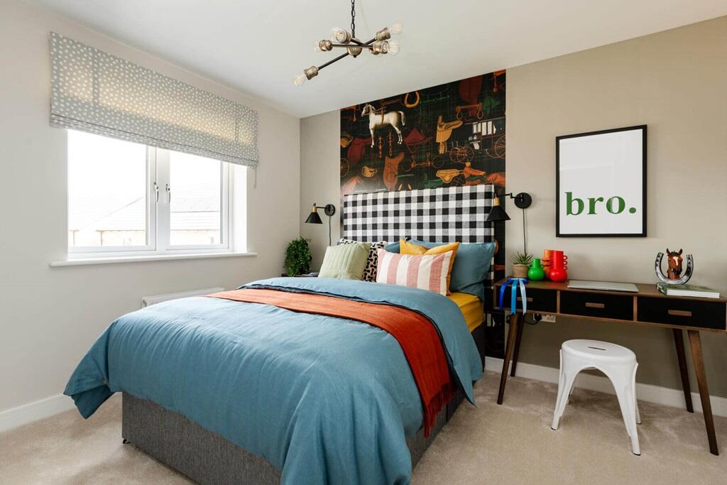 A third bedroom offers space for older children or guests