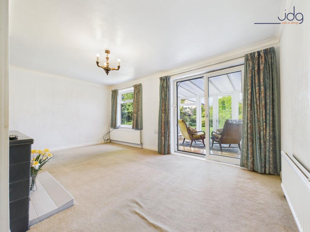 Living Room with patio doors to the Conservatory