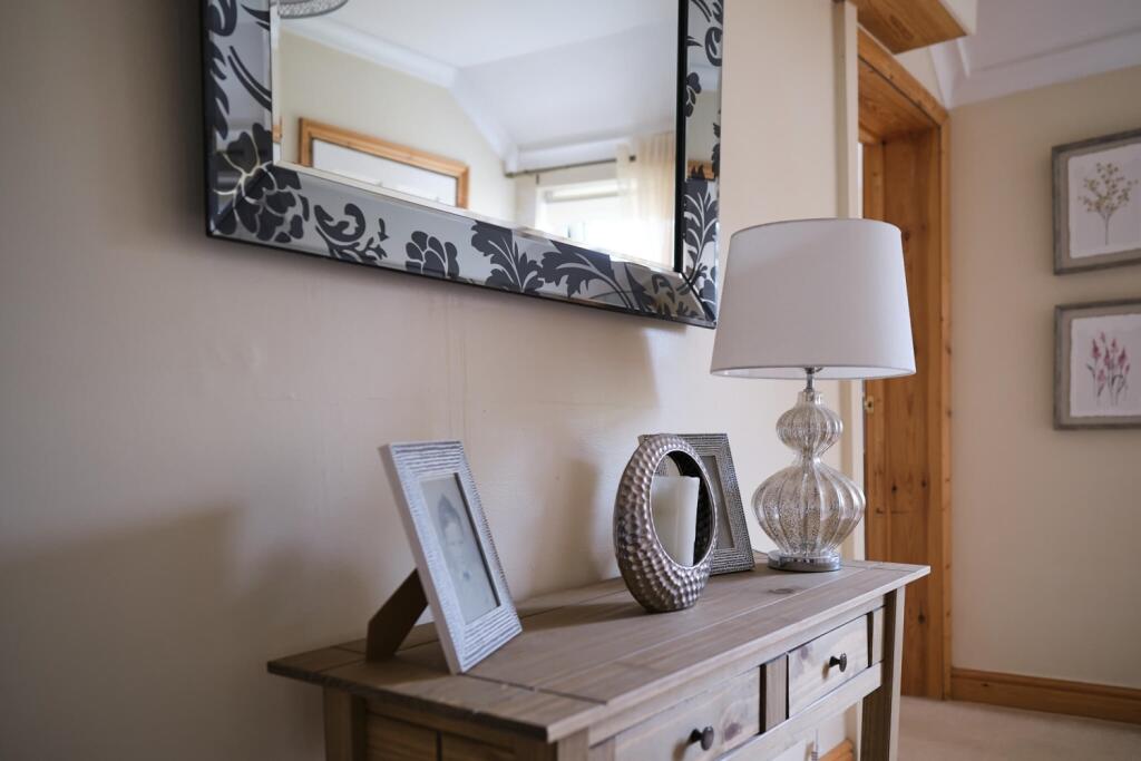 The landing serves as a hub connecting the bedroom