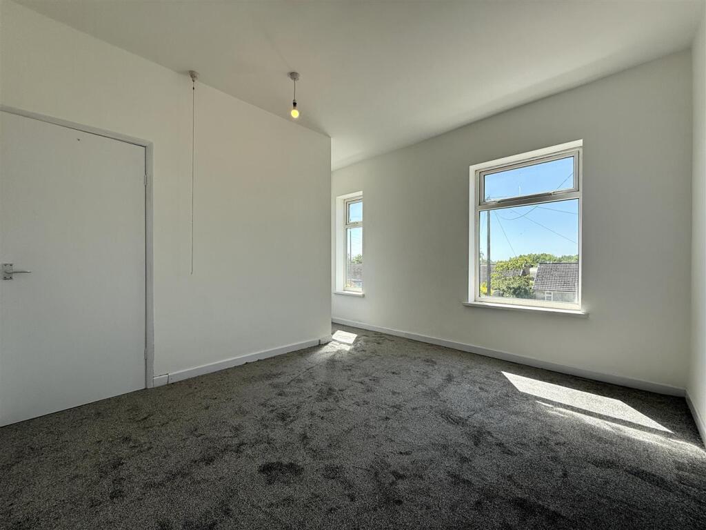 7 Bedroom One.JPEG
