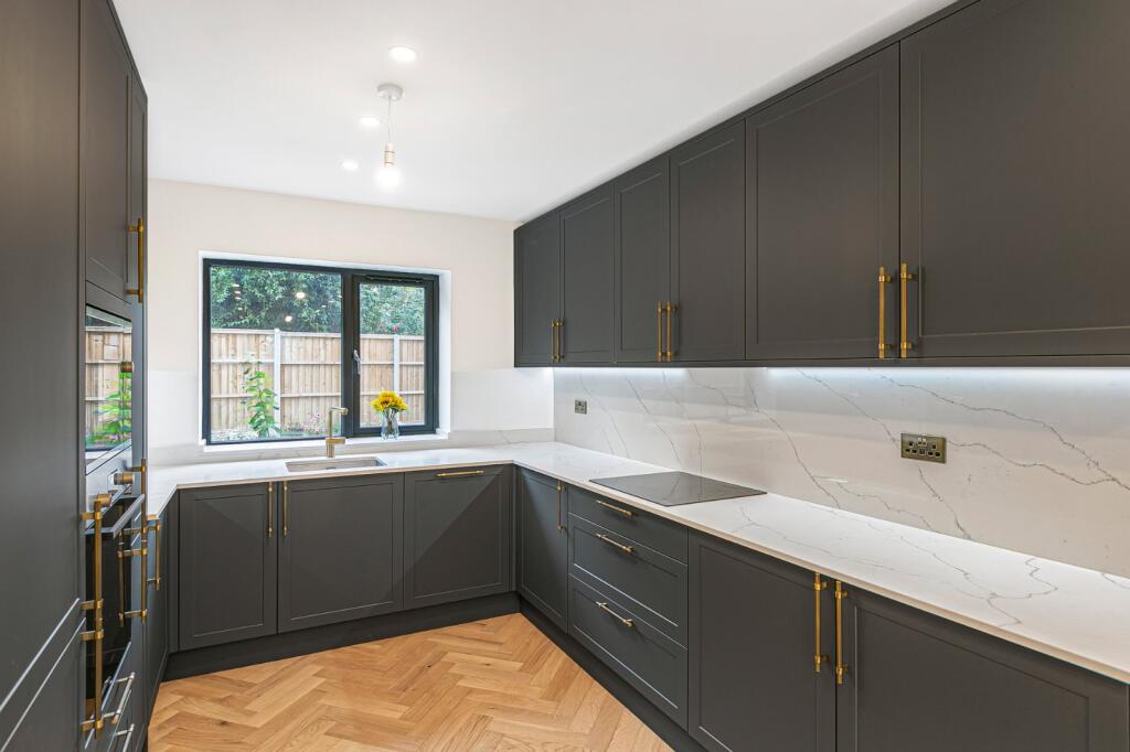 property in Grand Drive, 
Raynes Park, SW20